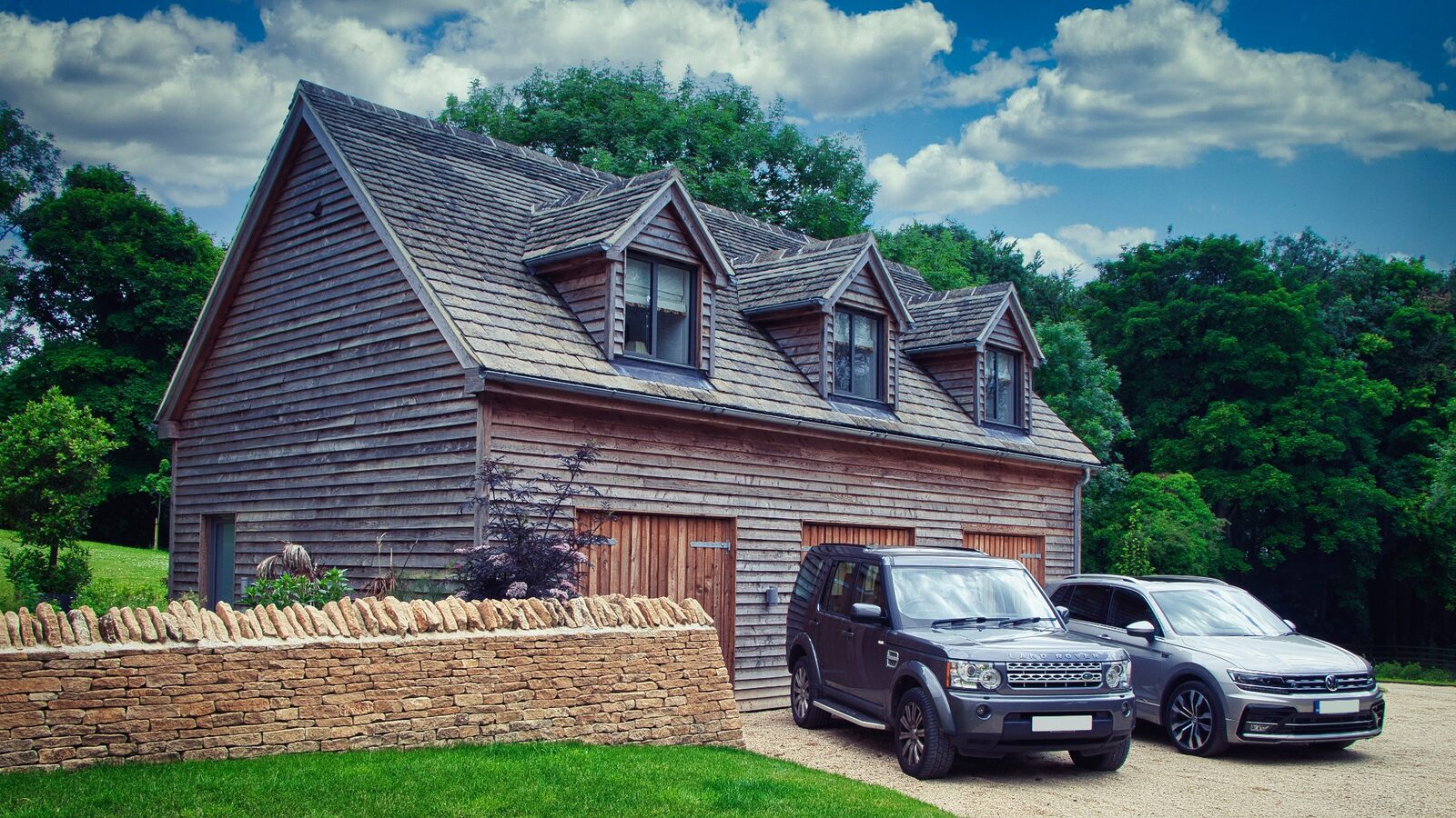 Loft accommodation at Hewletts Farm behind a drystone wall